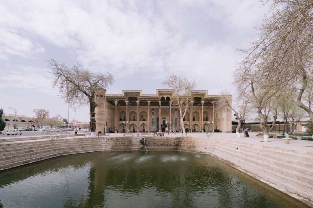 Bolo Haouz Mosque with reflecting pool in front, historic Silk Road site in Bukhara Uzbekistan