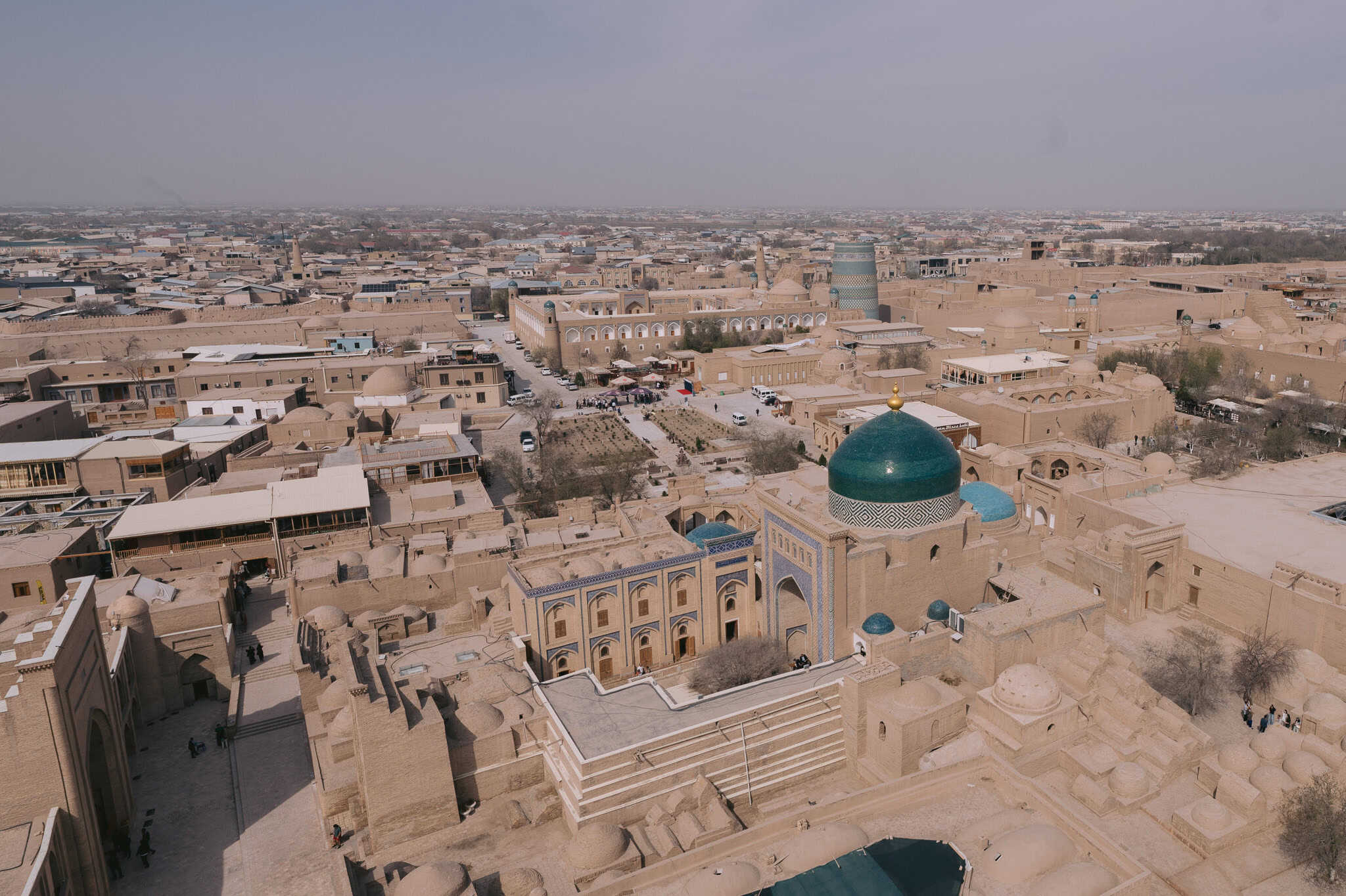 Panoramic view of Khiva, Uzbekistan with turquoise domes and mud-brick buildings along the Silk Road.
