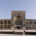 Mosaic-covered facade of Nadir Divan-Begi Madrassa in Bukhara, Uzbekistan.