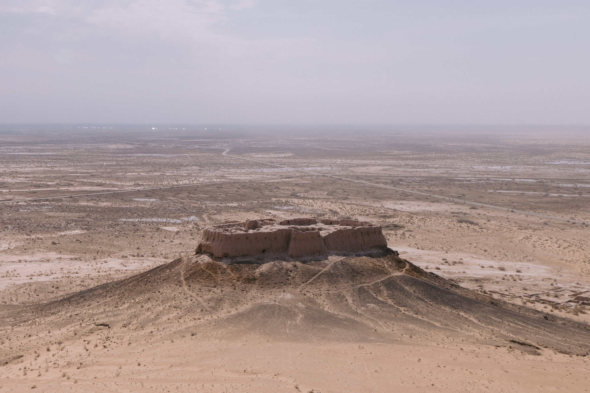 Desert fortress ruins in Karakalpakstan, Uzbekistan, part of the Silk Road history.