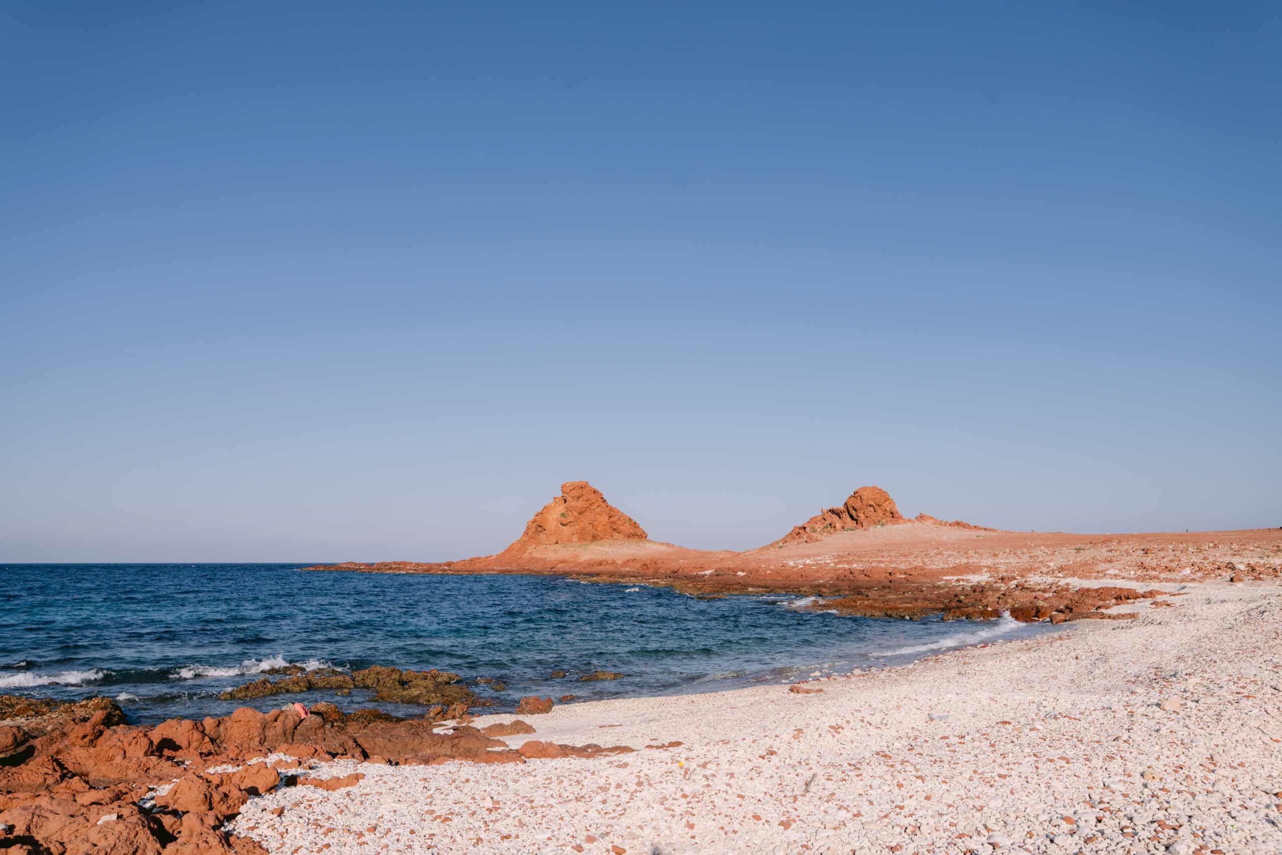 Rocky red coastline at Ras Erissel, the eastern tip of Socotra Island.
