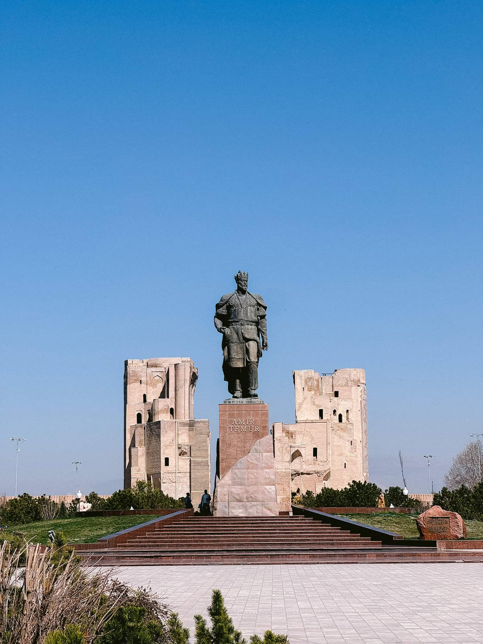 Statue of Amir Timur in front of Ak-Saray Palace ruins in Shahrisabz, Uzbekistan